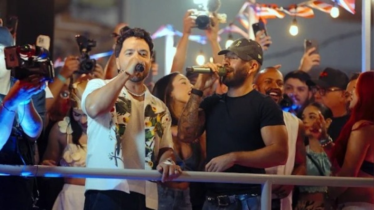 Luis Fonsi y Feid desatan la euforia del público al revelar su primera colaboración juntos, “Cambiaré”